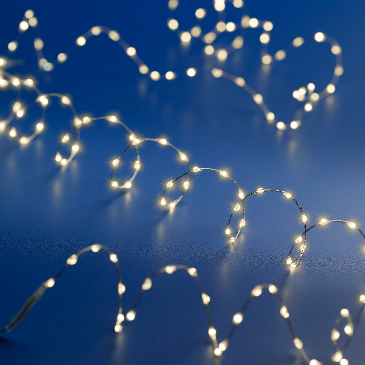 Lampki micro LED na baterie – 100L na druciku ciepły biały